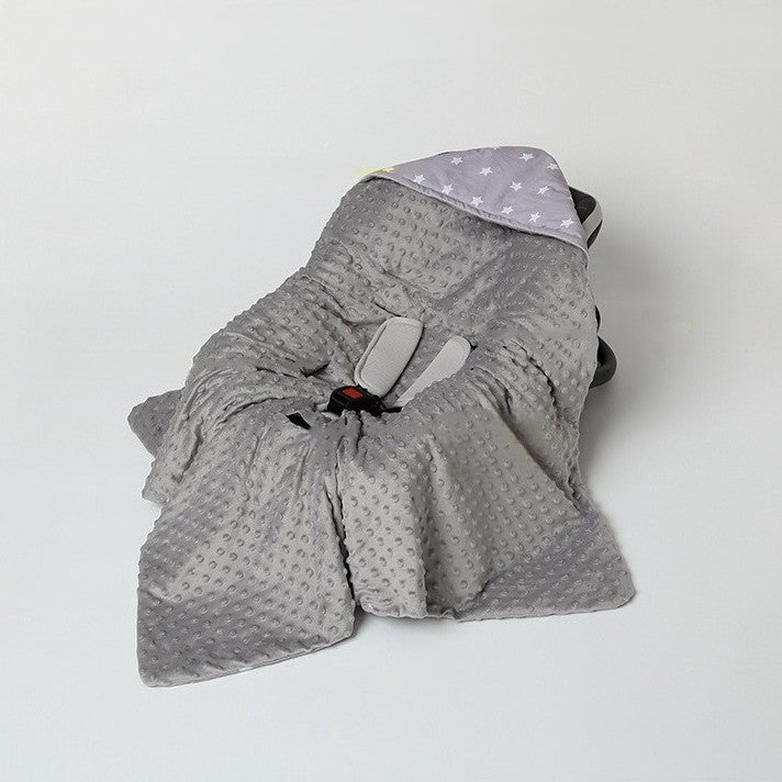 nid d'ange bébé rêve étoilé installé pour bébé dans cosy
