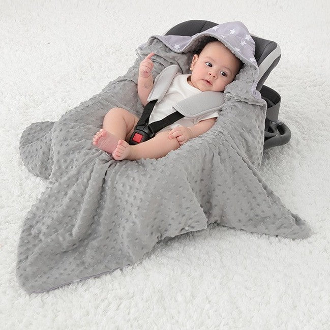 nid d'ange bébé rêve étoilé montrant bébé attaché sécuritairement