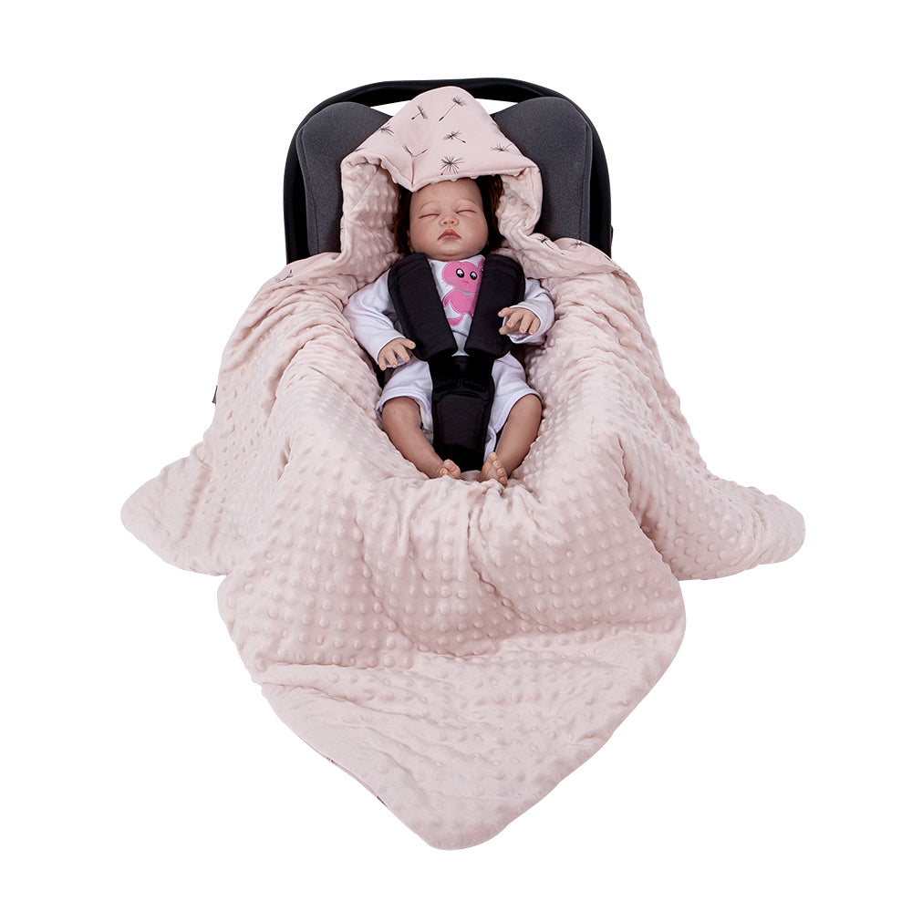 nid d'ange bebe souffle de pissenlit illustrant bébé dans cosy