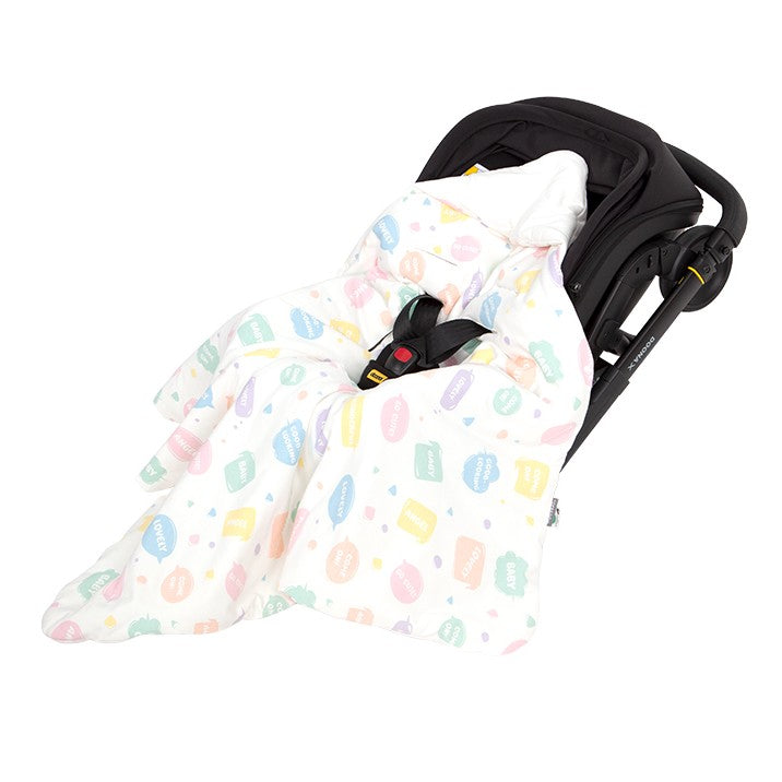 nid d'ange cosy Chatty Mood™ réversible installé sur poussette