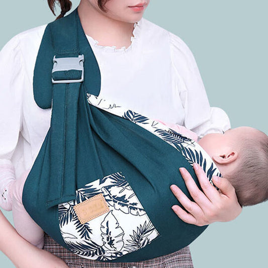 sling bebe NursingTowel™ montrant bébé dormant contre maman