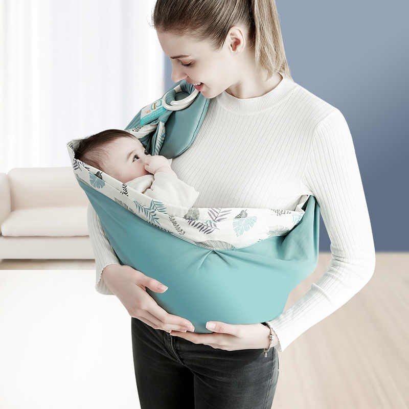 écharpe de portage BabyWrap™ montrant maman qui porte bébé