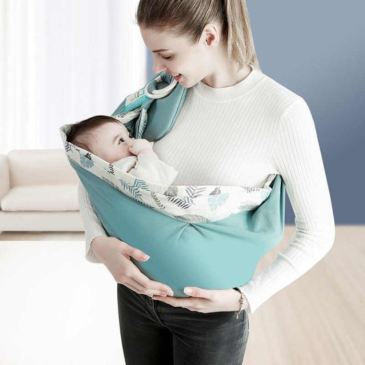 écharpe de portage BabyWrap™ montrant maman qui porte bébé
