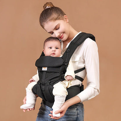 porte bebe noir avec bébé devant