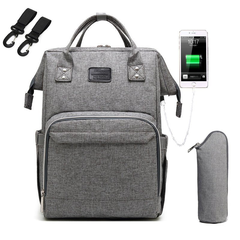 sac a dos a langer gris pâle avec port USB
