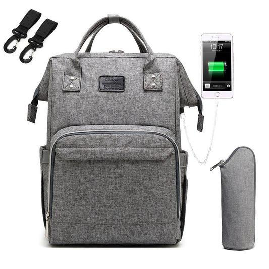 sac a dos a langer gris pâle avec port USB