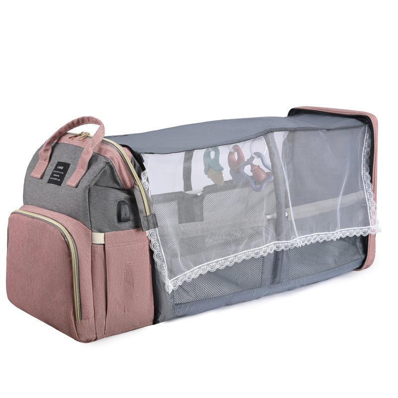 sac à dos à langer avec mode berceau avec moustiquaire