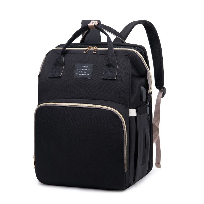 sac à dos à langer avec lit pliable noir