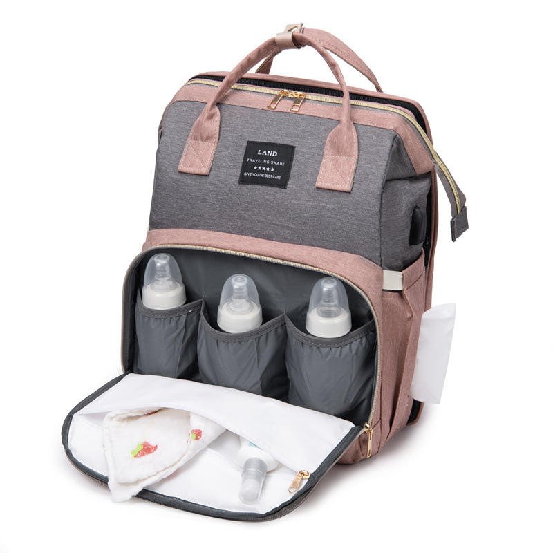 sac à dos à langer avec compartiments isothermes pour biberons