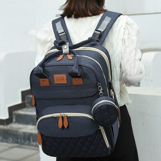 sac à dos à langer porté en sac à dos