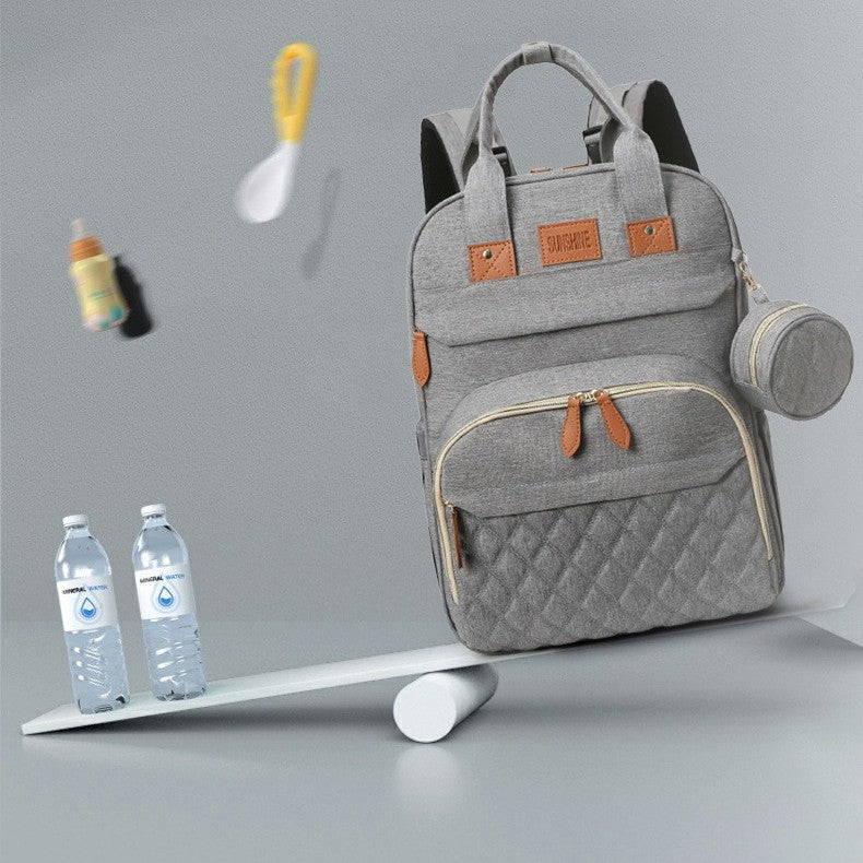 sac à dos à langer et lit portable léger