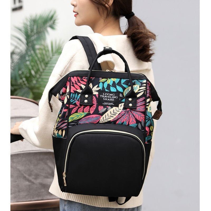 sac a dos a langer tendance porté sur une épaule