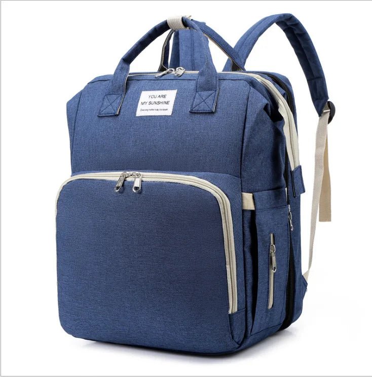 sac à dos à langer transformable marine