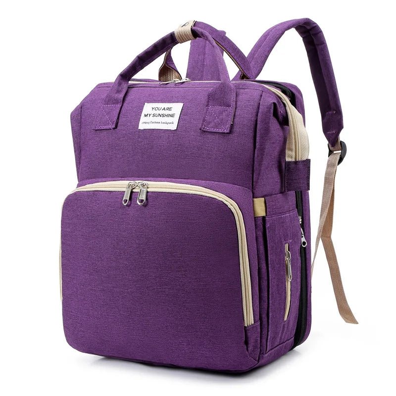 sac à dos à langer transformable violet
