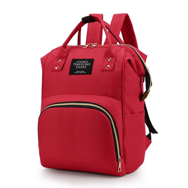 sac à dos à langer couleur rouge