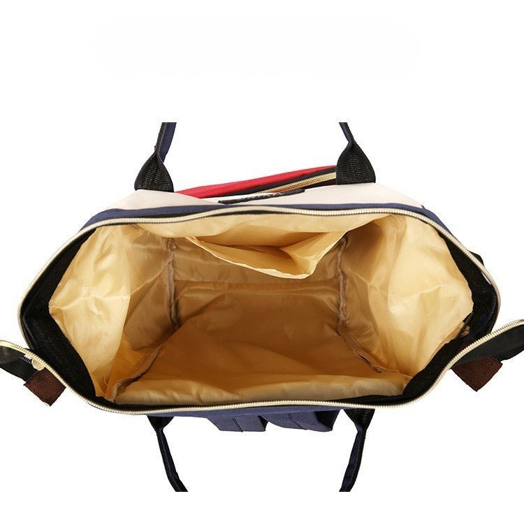sac à dos à langer avec intérieur spacieux