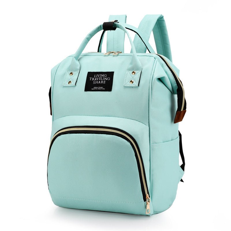 sac à dos à langer couleur verte