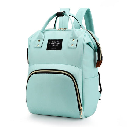 sac à dos à langer couleur verte