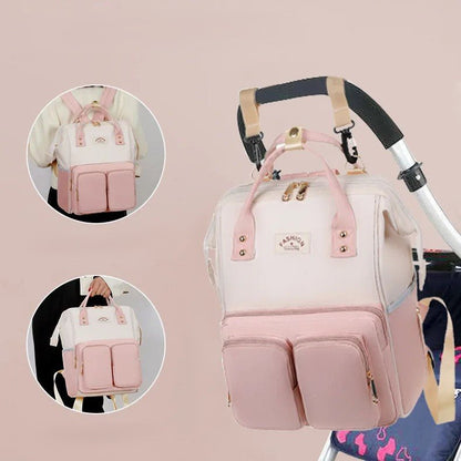 sac a dos a langer avec poignée et fixation poussette
