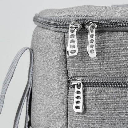 sac à langer ingénieux avec fermetures éclair de qualité
