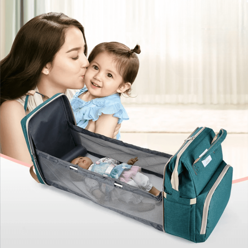 Sac de voyage vert transformable en lit