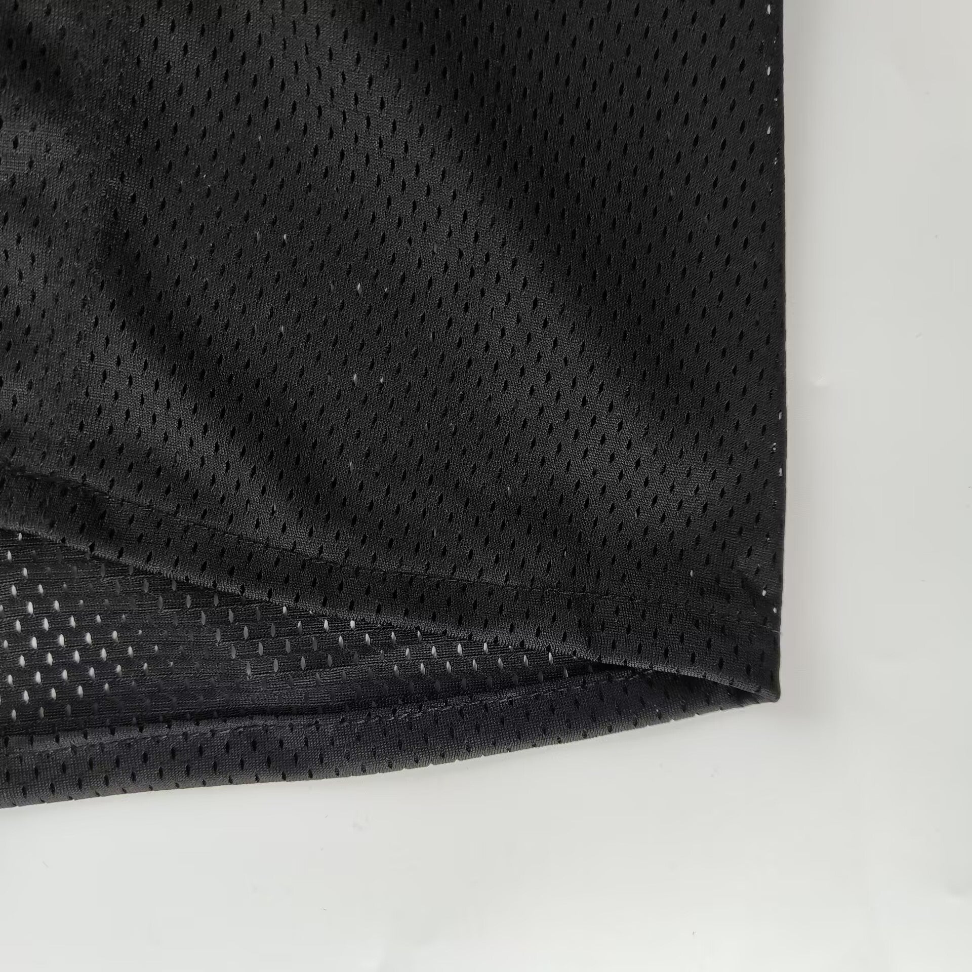 sling respirant noir en mailles respirantes