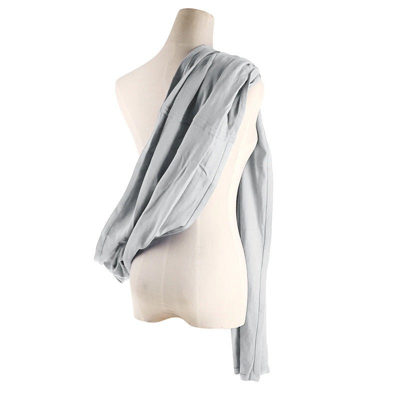 sling gris porté sur l'épaule vue de dos