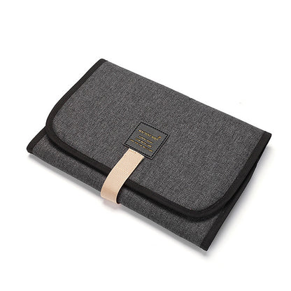 tapis à langer imperméable nomade couleur gris foncé