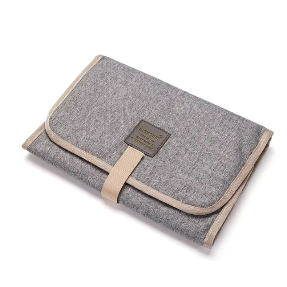 tapis à langer imperméable nomade de couleur nuage clair