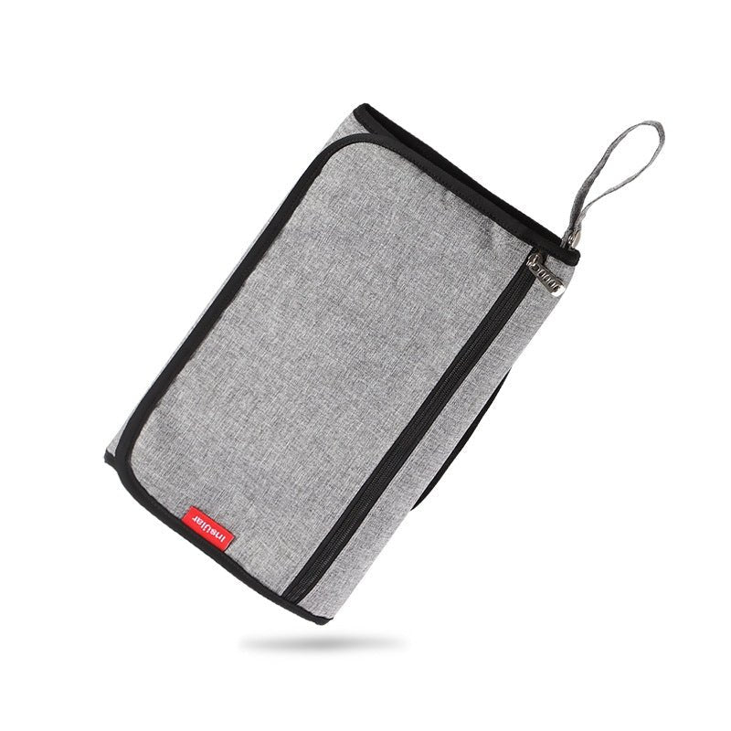 tapis à langer nomade compact gris