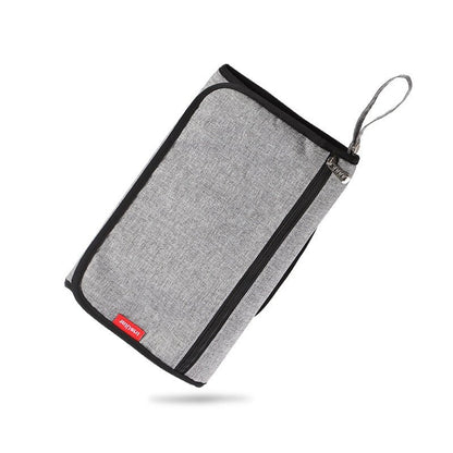 tapis à langer nomade compact gris