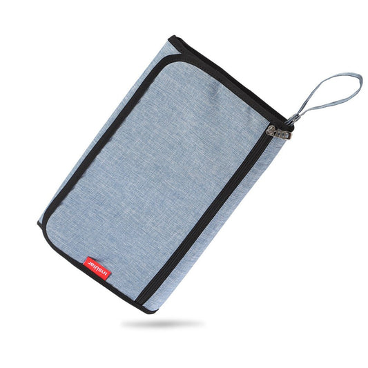 tapis à langer nomade compact couleur bleu jean