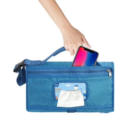 tapis à langer nomade avec pochettes pour lingettes et téléphone
