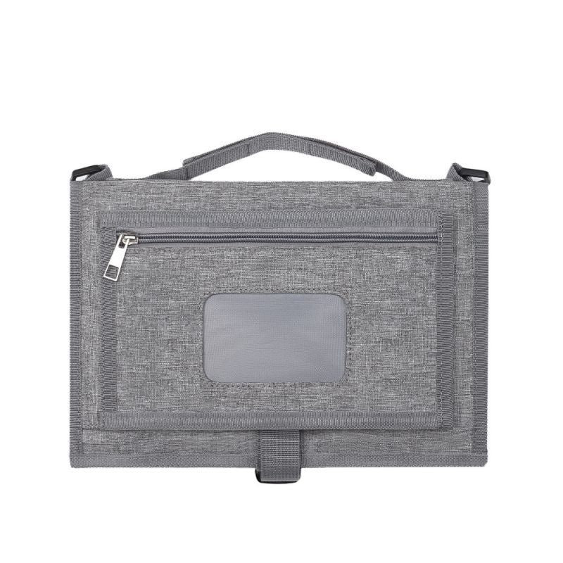 tapis à langer nomade polyvalent gris avec fermeture éclair
