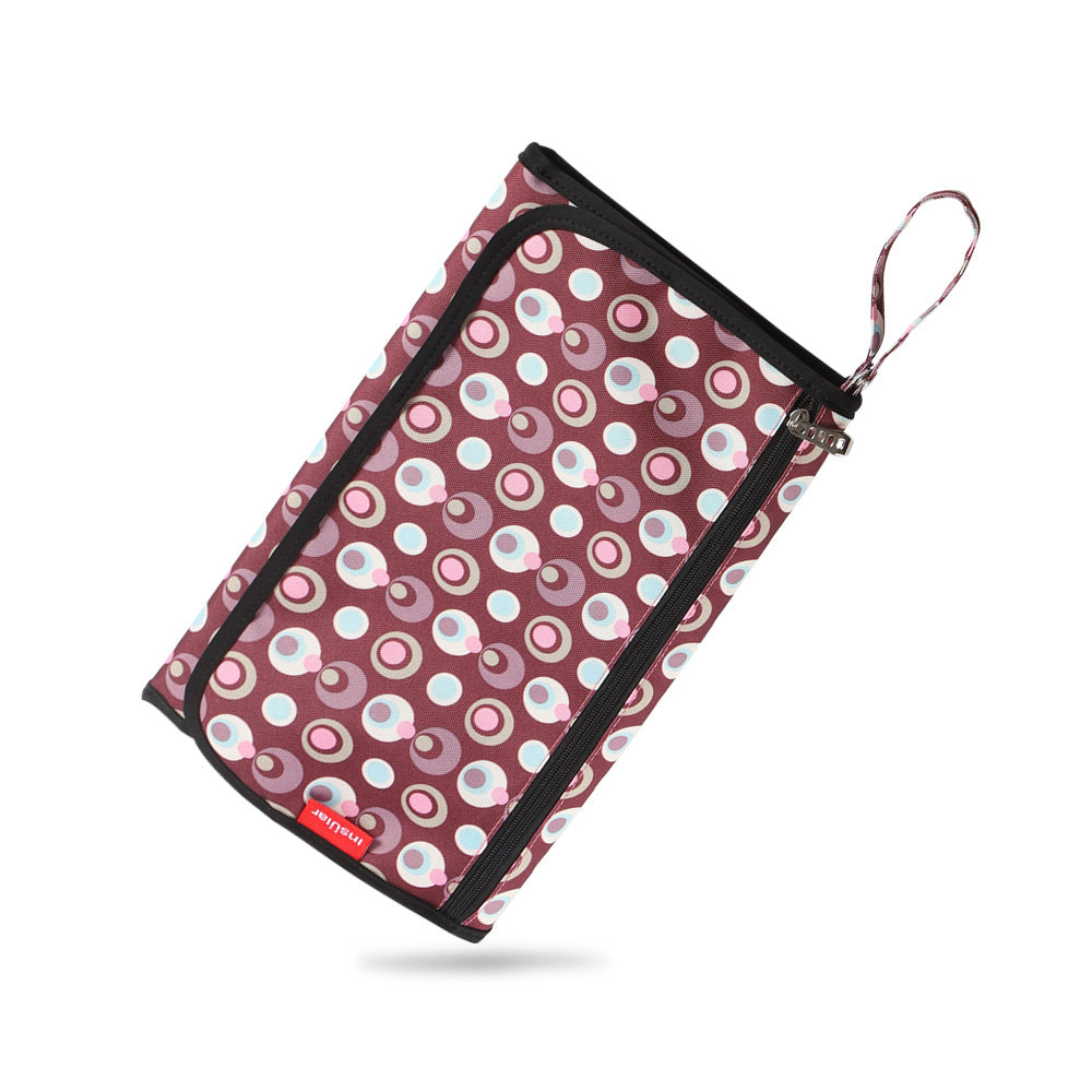 tapis a langer voyage pliable et imperméable couleur framboise chic