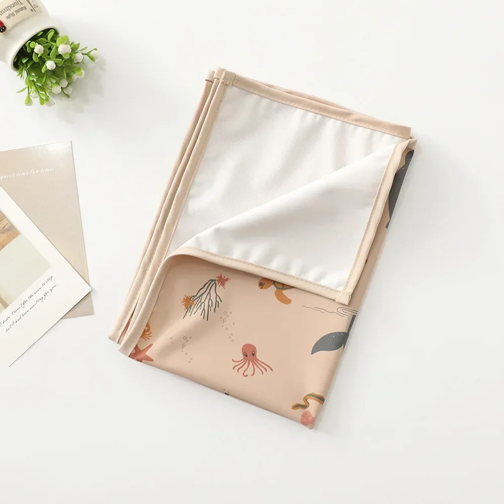 Tapis langer nomade compact et imperméable motif océan rose poétique