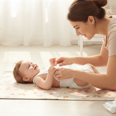 Tapis langer nomade compact et imperméable pratique pour change rapide